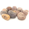 A collection of tumbled Pink Amethyst gemstones on a white background, front and center overview.