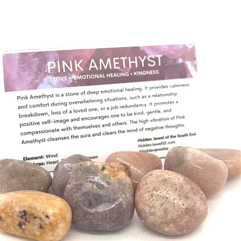 A collection of tumbled Pink Amethyst gemstones with an information card on a white background, front and center overview.