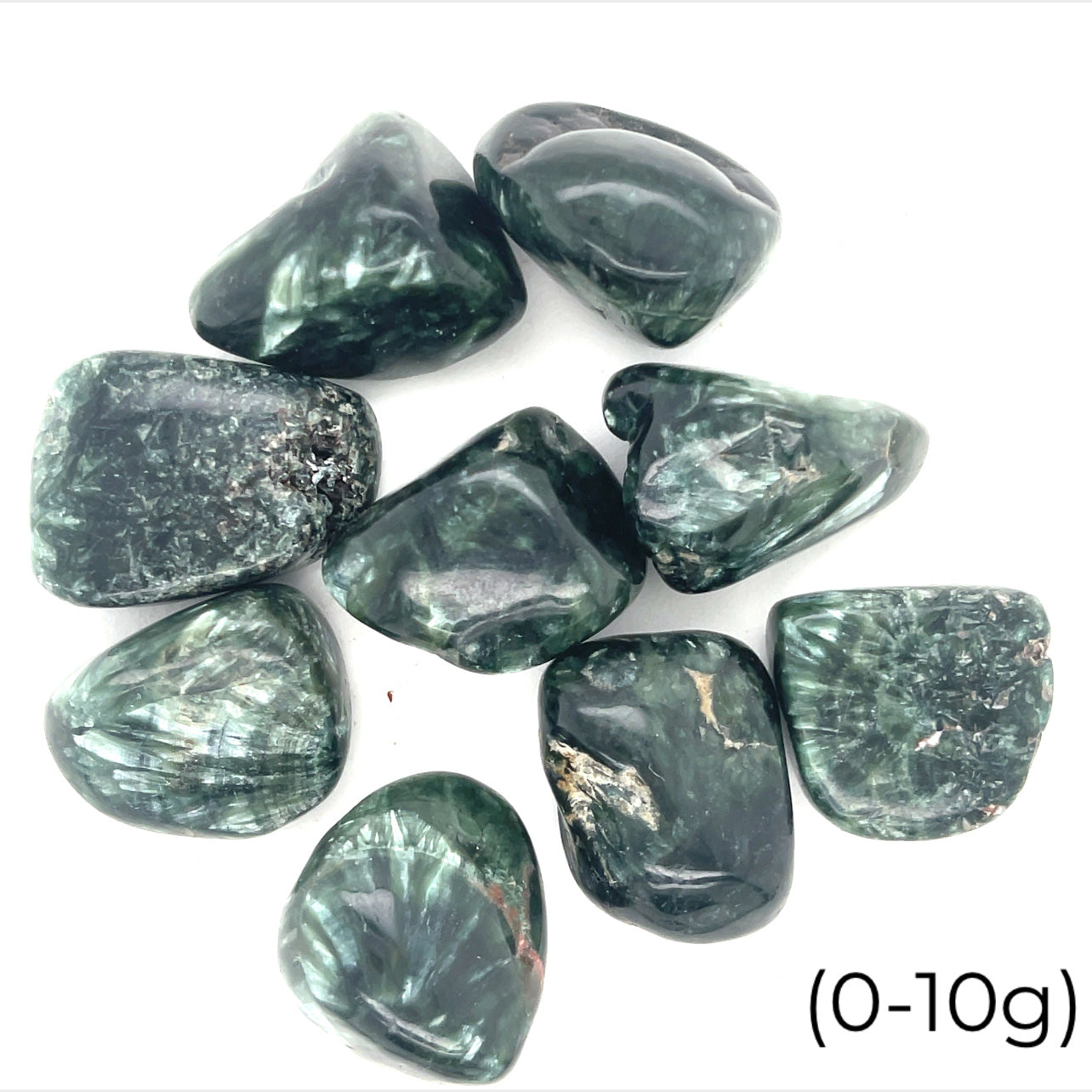 A collection of tumbled Seraphinite gemstones with a range of green hues and unique white markings on a white background, front view. size (0-10g)
