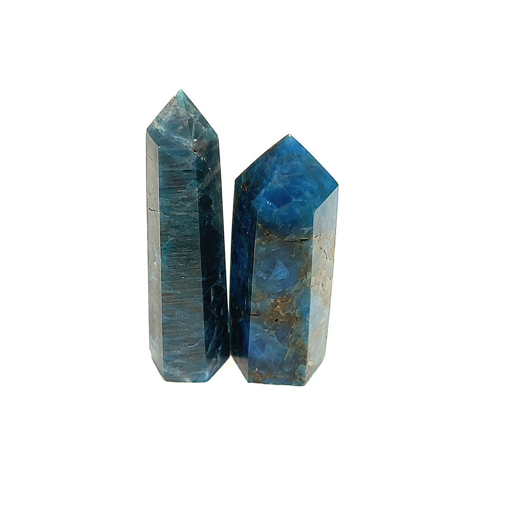 A collection of two Blue Apatite Gemstone Towers arranged in a line on a white background, front view.