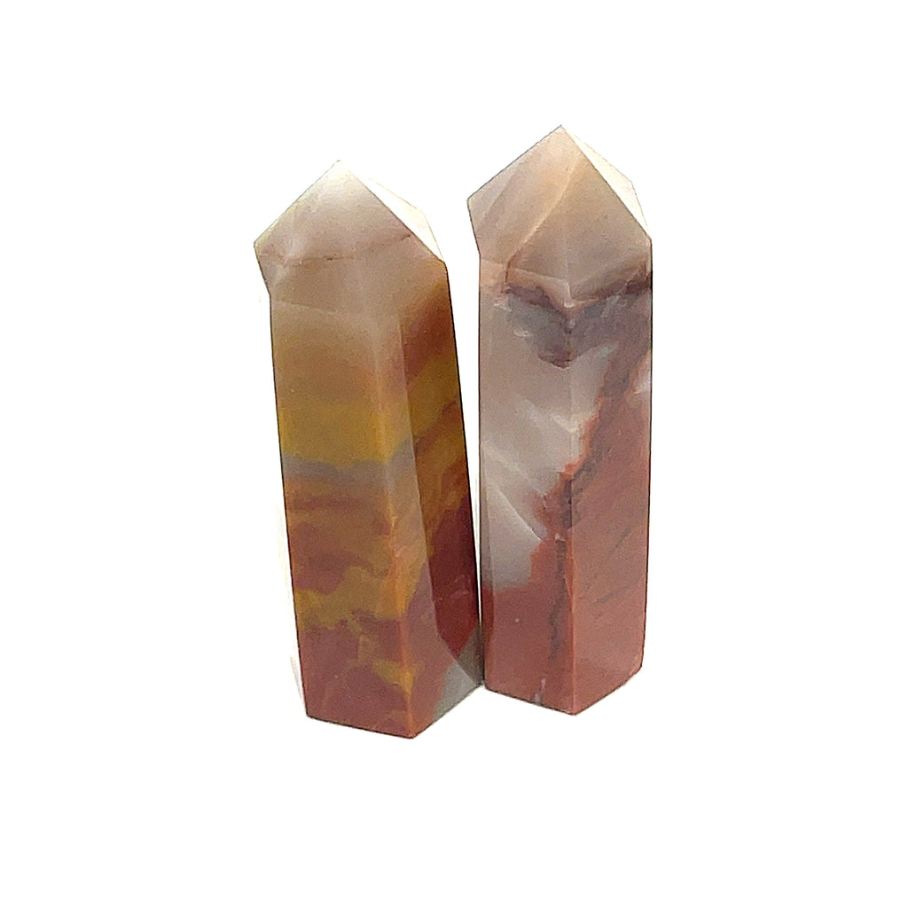 A collection of two small Red Jasper gemstone towers of varying sizes, arranged vertically, displaying their polished, rectangular faceted shapes and translucent red coloring on a white background front view.