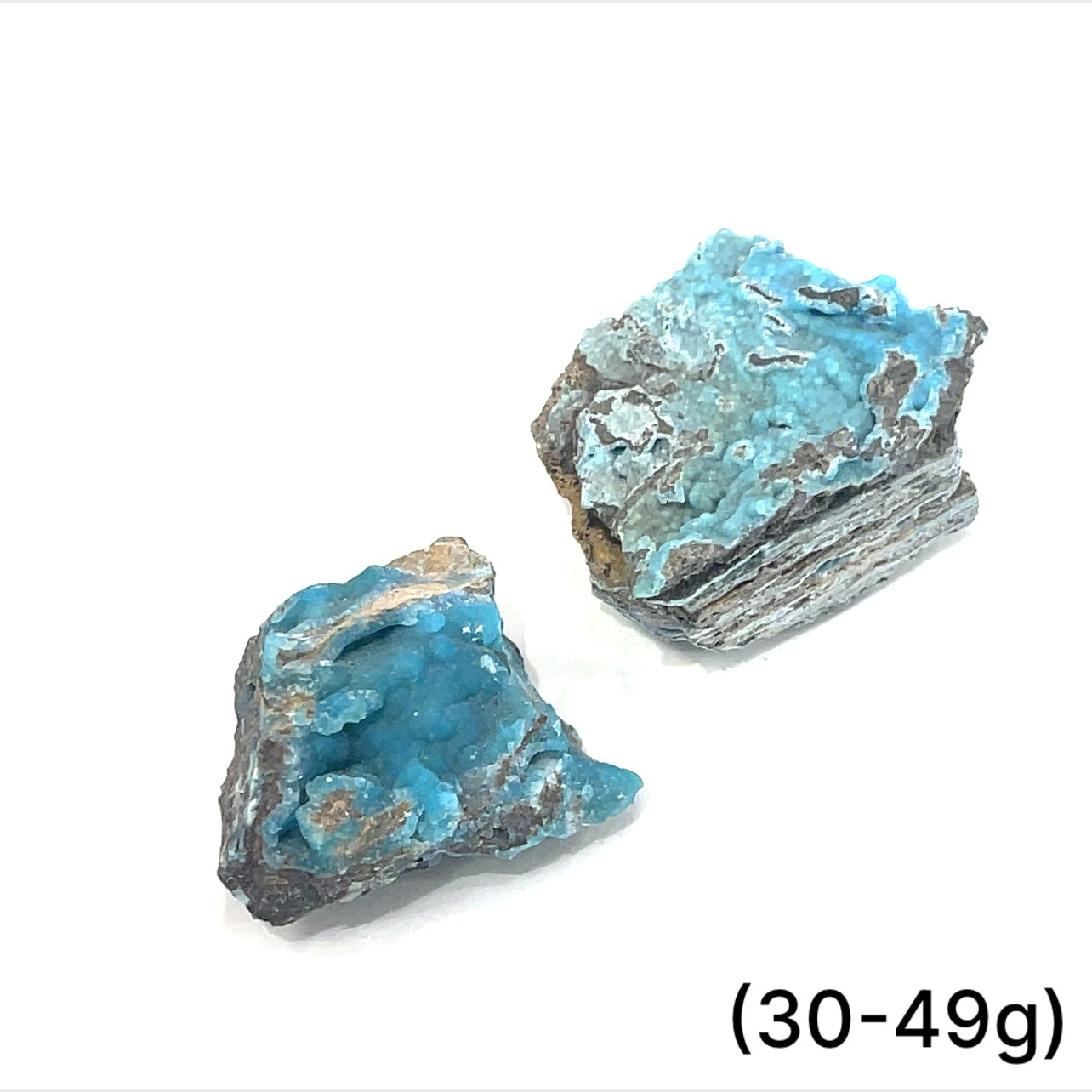 A group of (30-49g) of raw Hemimorphite pieces on  a white background, front view. 