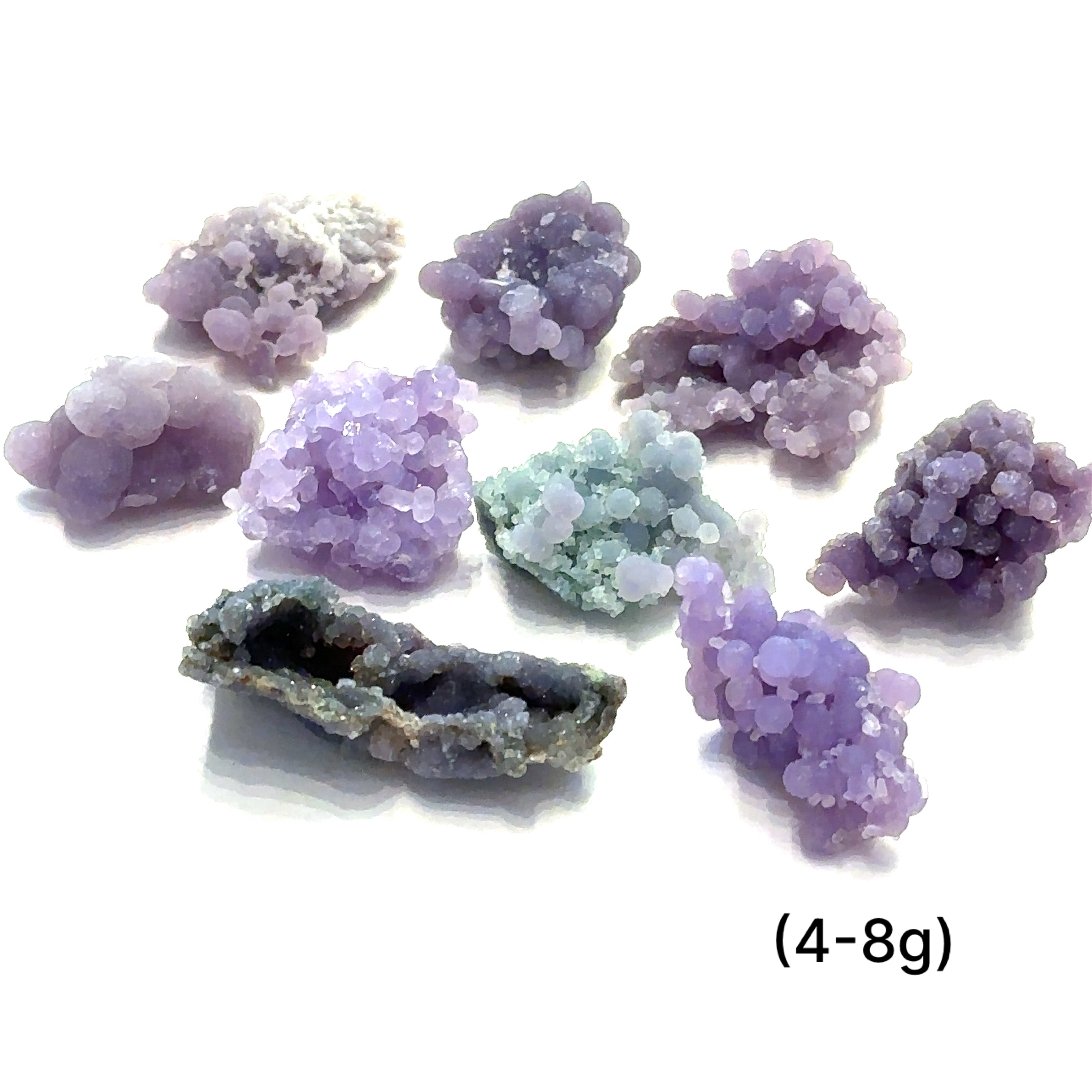 A group of (4-8g) grape agate gemstone  on a white background, front close up overview. 