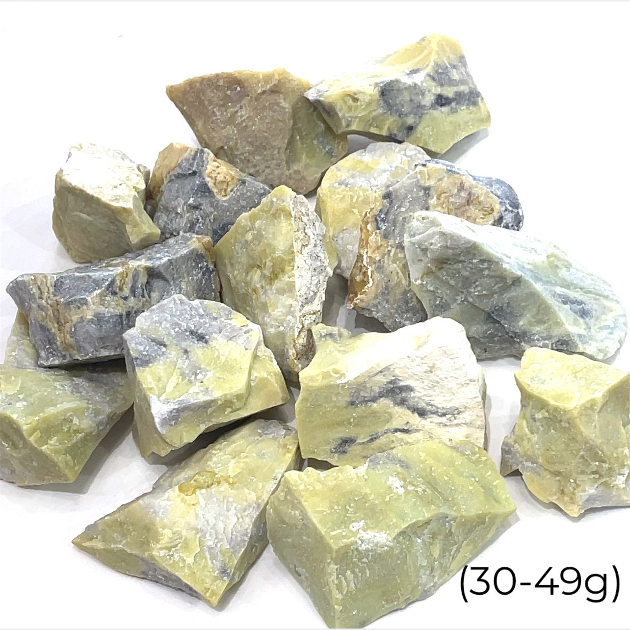 A group of Devalite stone (30-49g) used in meditation and crystal healing – grounding Earth energy. on a white background front overview.