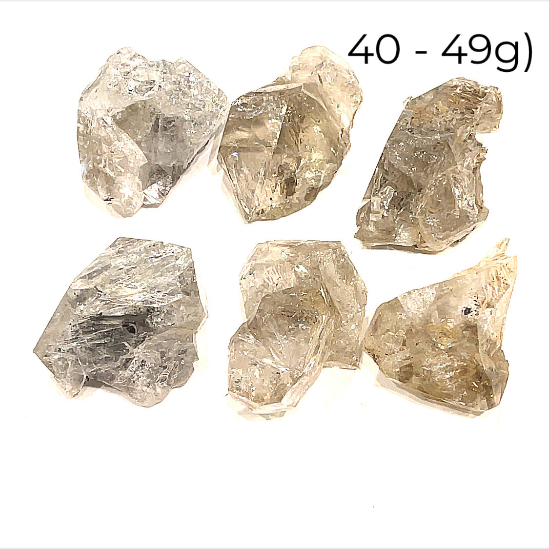 A group of raw Herkimer diamond gemstone (40-49g) displayed on a white background, front, overview. 