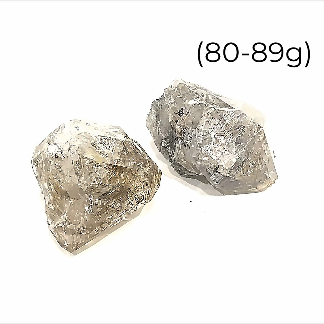A group of raw Herkimer diamond gemstone (80-89g) displayed on a white background, front, overview. 