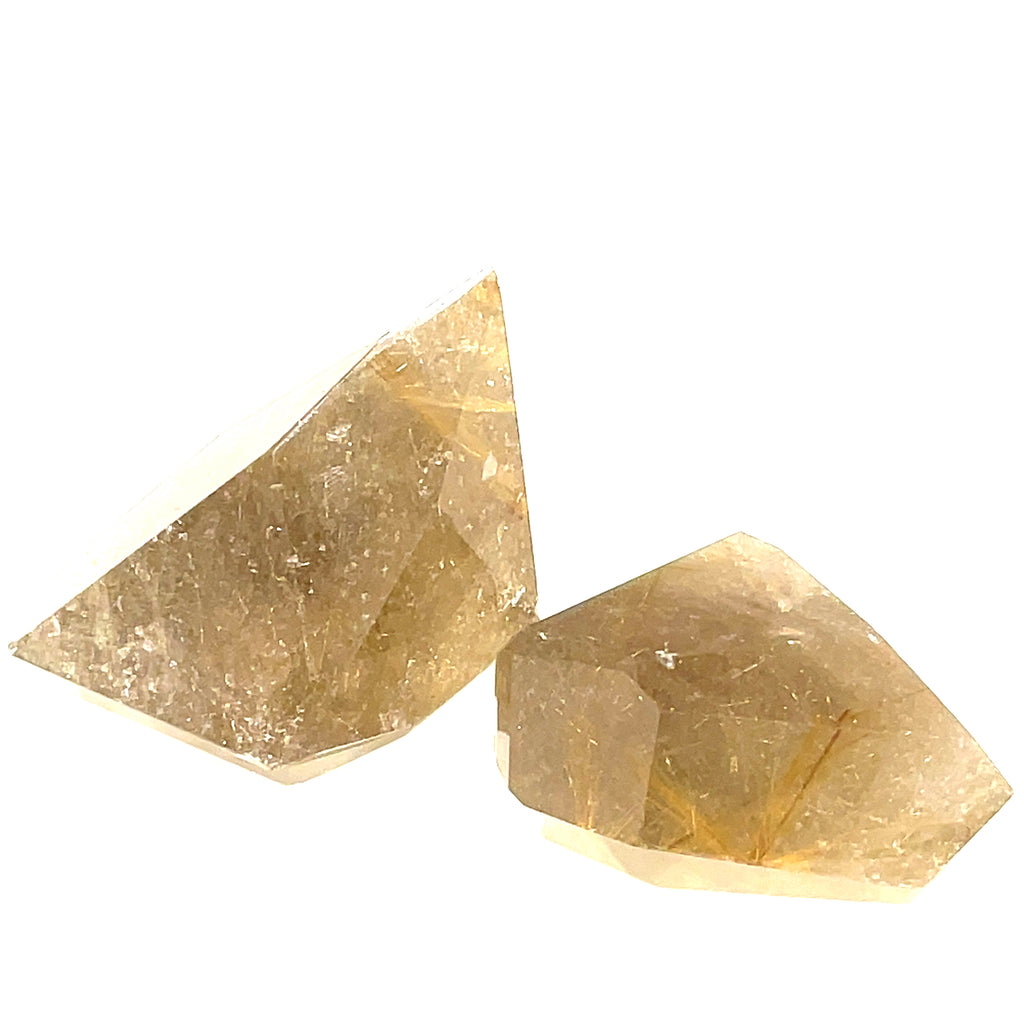  A group of two free-form Rutilated Quartz gemstone on a white background, front overview.