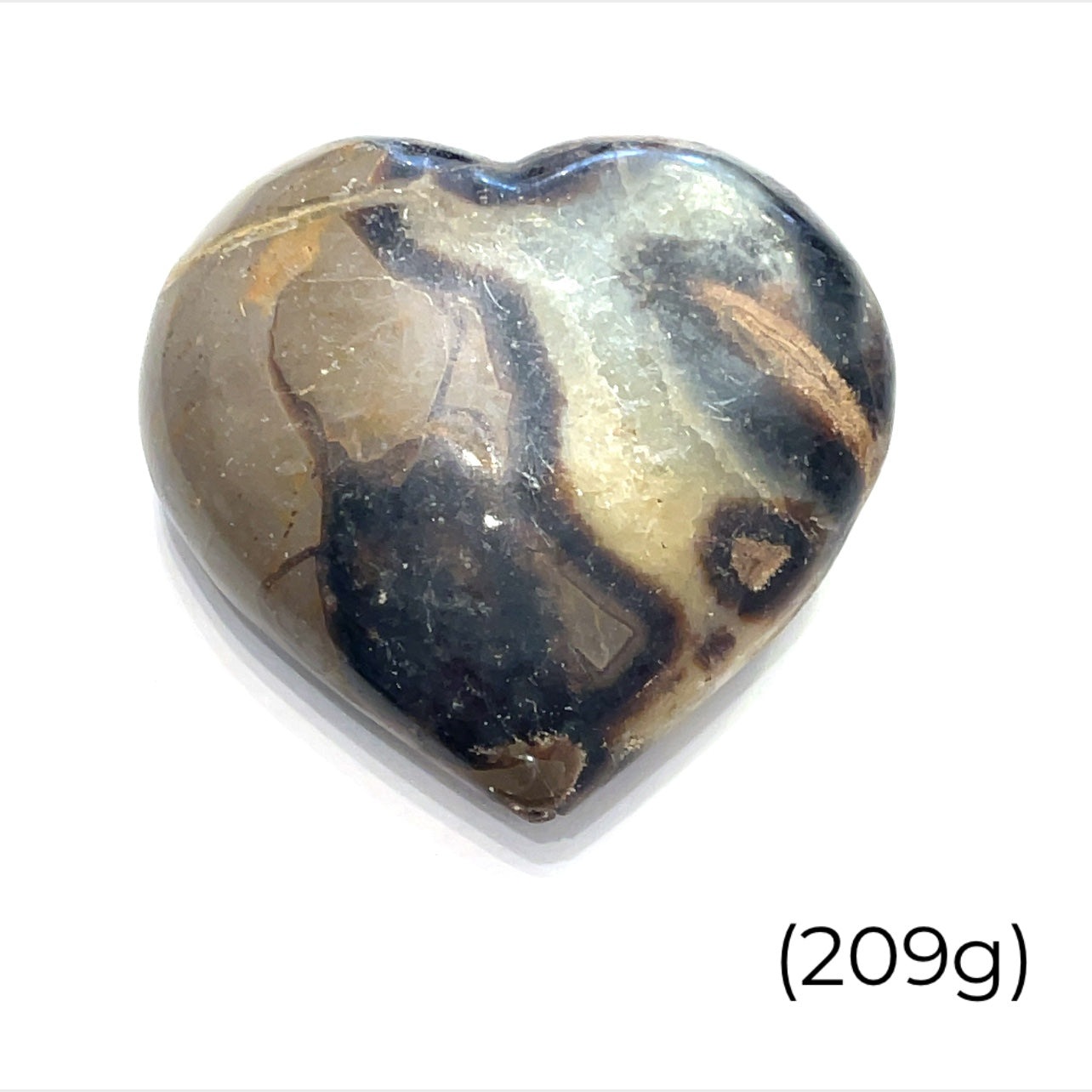 A heart-shaped Septarian Nodule gemstones against a white background, front view (209g)
