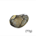 A heart-shaped Septarian Nodule gemstones against a white background, front view (77g)