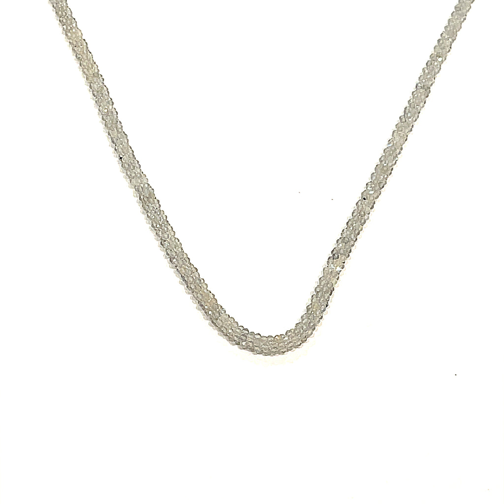 A labradorite gemstone crocheted necklace with a sterling silver toggle. Displayed on a white background, center hanging overview. 