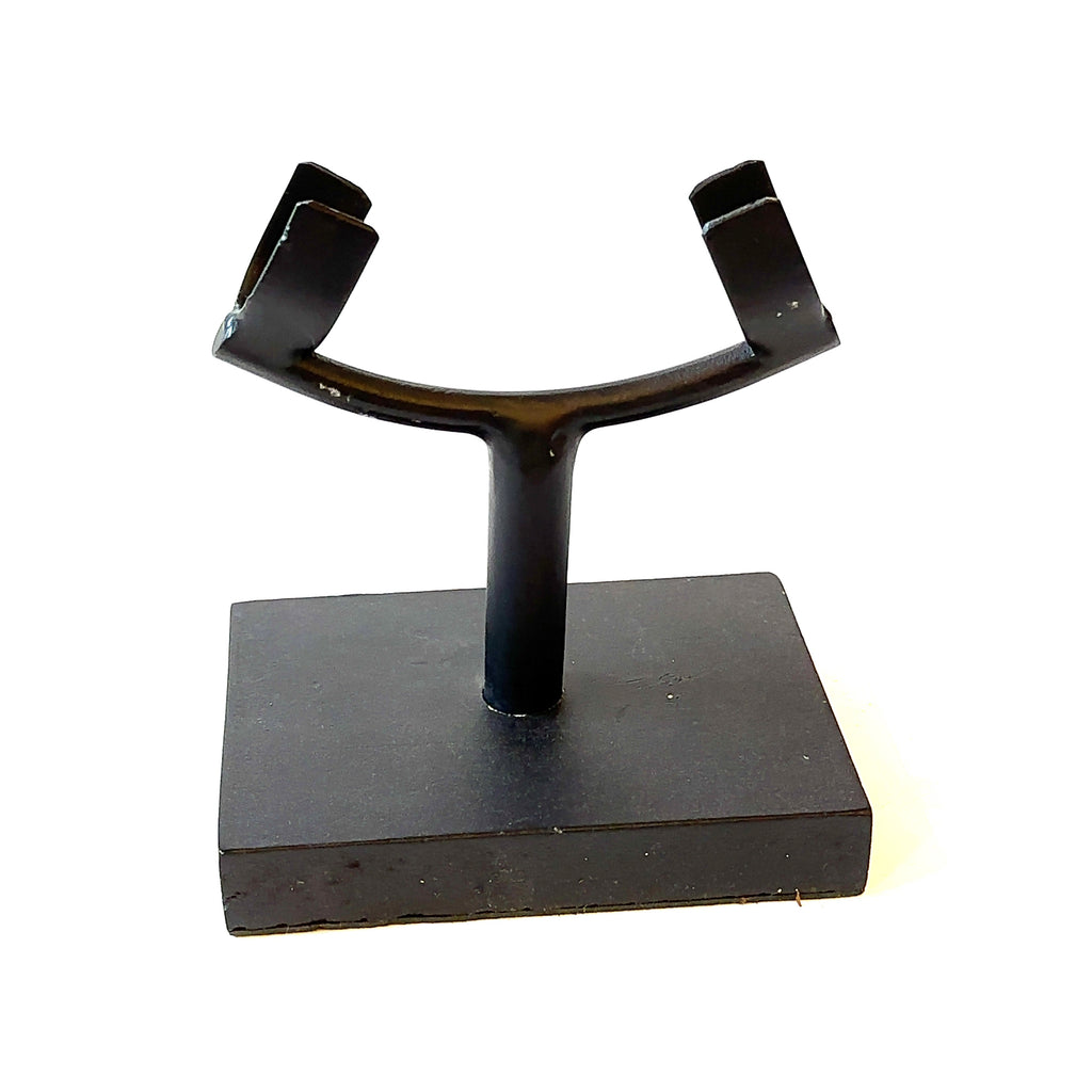 A  metal stand for the labradorite gemstone. On a white background, front view. 