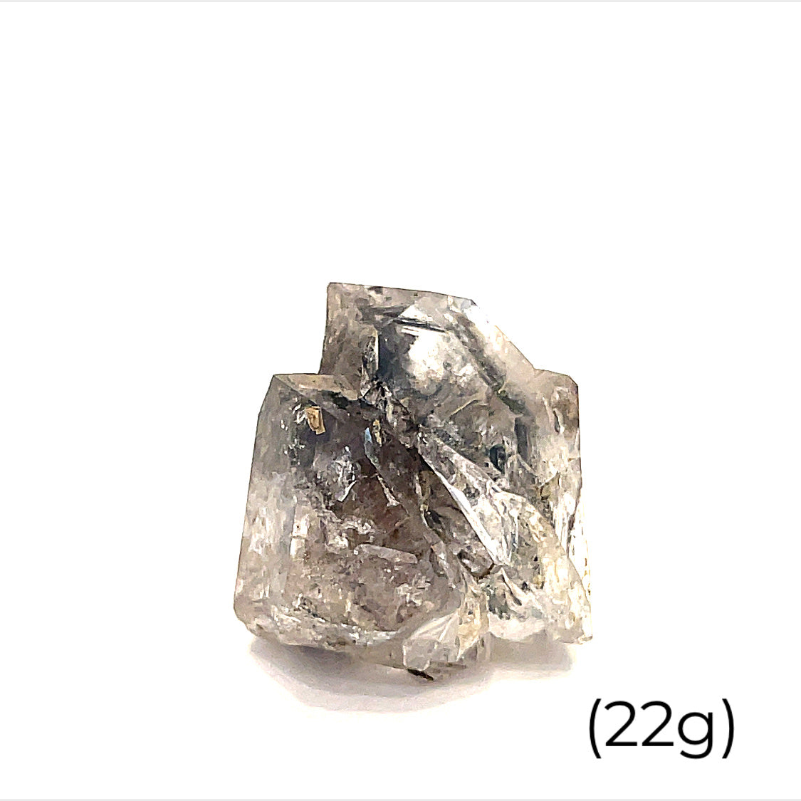 A raw Herkimer diamond gemstone (22g) displayed on a white background, front, overview. 