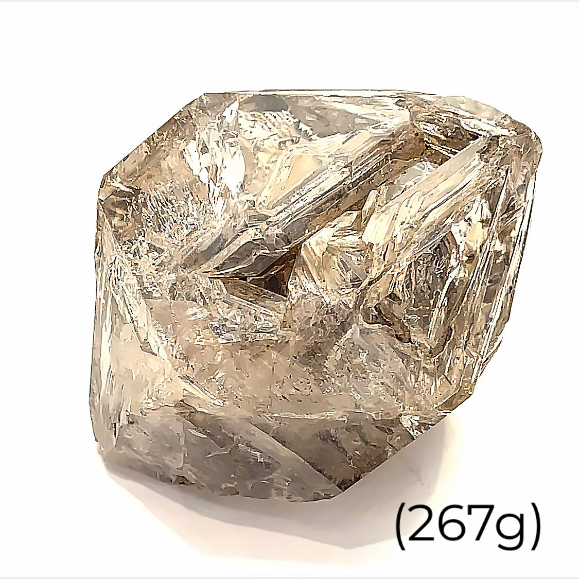 A  raw Herkimer diamond gemstone (267g) displayed on a white background, front, overview. 