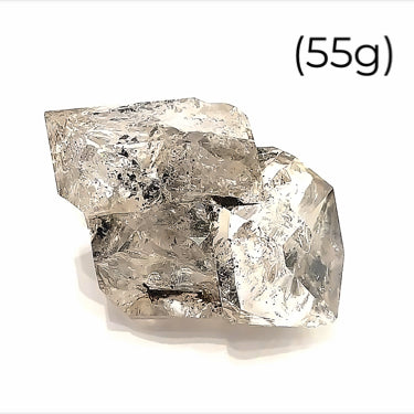 A  raw Herkimer diamond gemstone (55g) displayed on a white background, front, overview. 