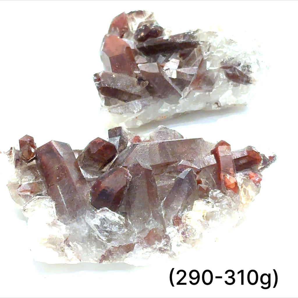 A raw Red Quartz gemstone cluster from Morocco with a rough, crystalline surface and a brownish-red color. The approximate weight range is indicated as 290-310g. on a white background, front view.