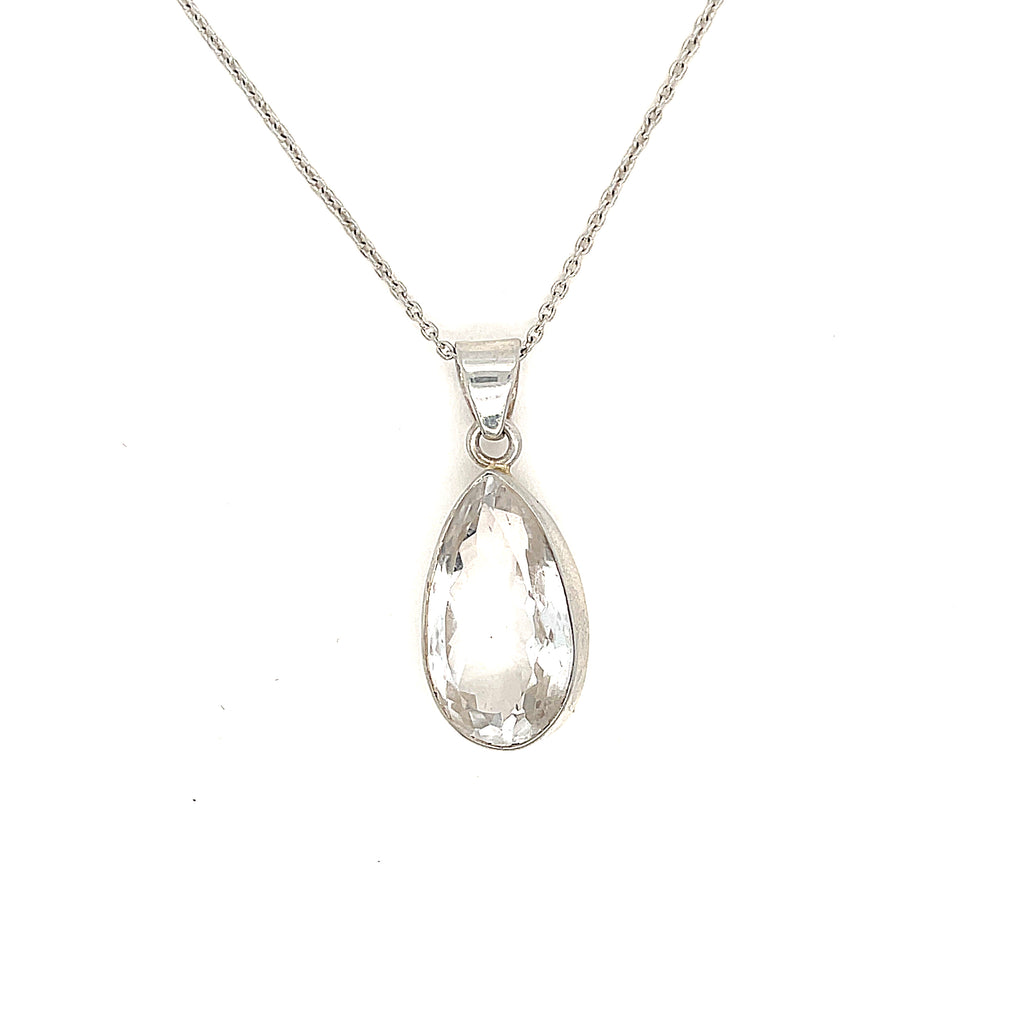 A sterling silver Rock Quartz gemstone  Pendant Necklace on white background, hanging front overview. 