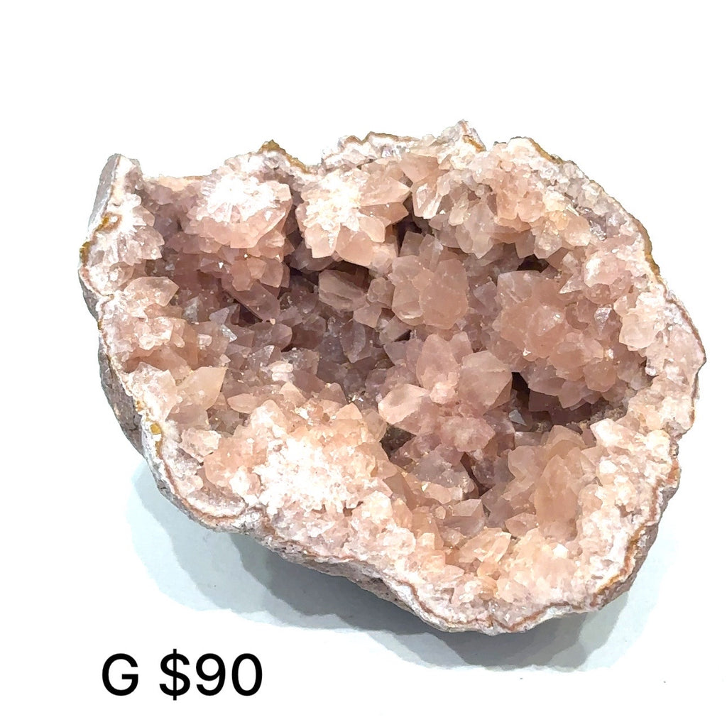 Close-up of AAA-grade Pink Amethyst cluster displaying translucent quartz and texture on white #G front view