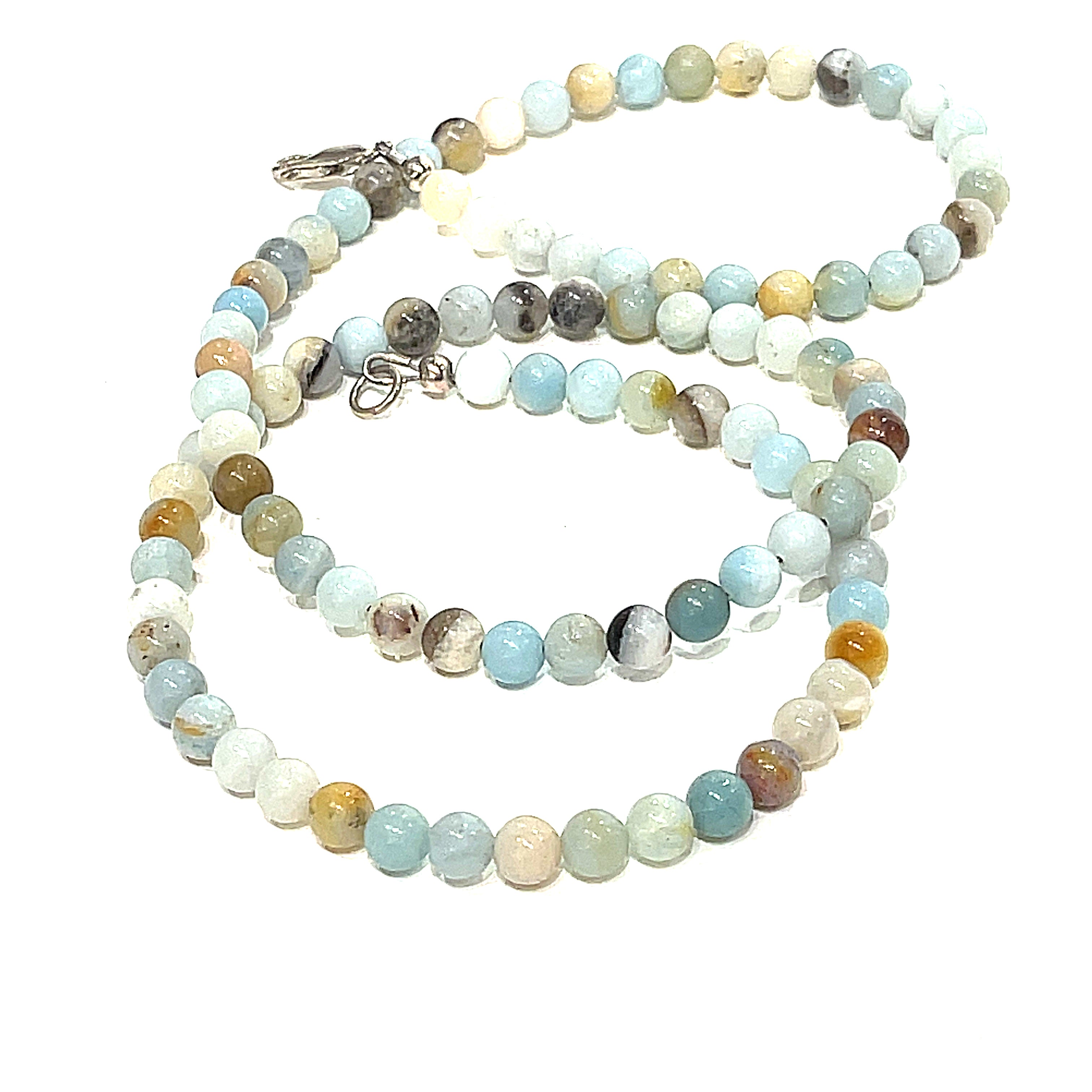 An Amazonite gemstone beaded necklace with a sterling silver lobster claw, spiral, close- up  overview.