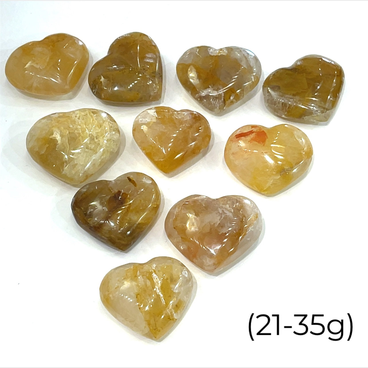 Assorted Golden Healer Hearts (21-35g) – each unique in pattern and energy on a white background front overview.