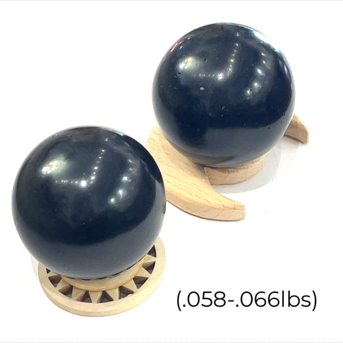  Black Tourmaline Sphere used for energy grounding and meditation on a white background front view. 