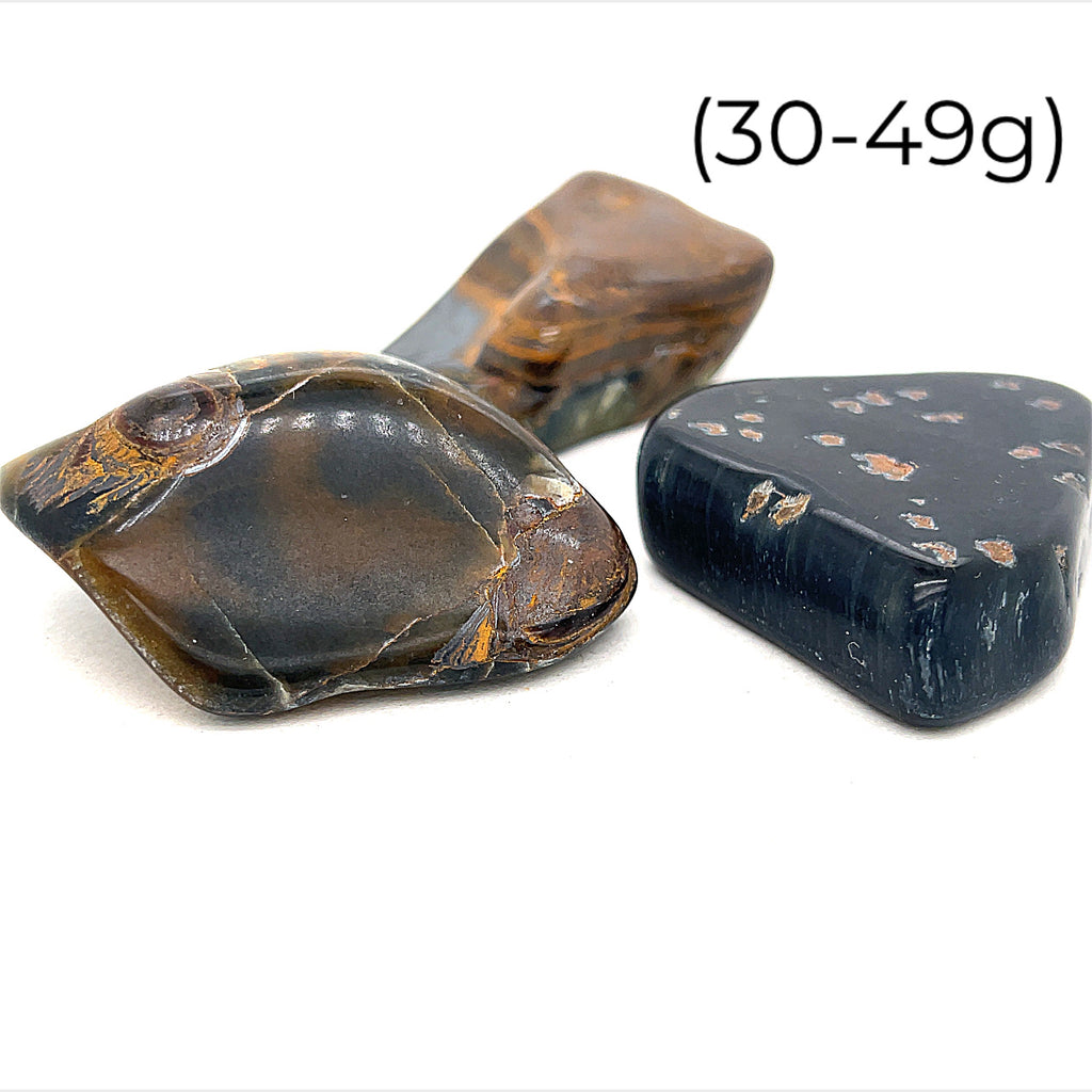 Blue Tiger Eye Tumbled Gemstone grouping on white30-49g overview