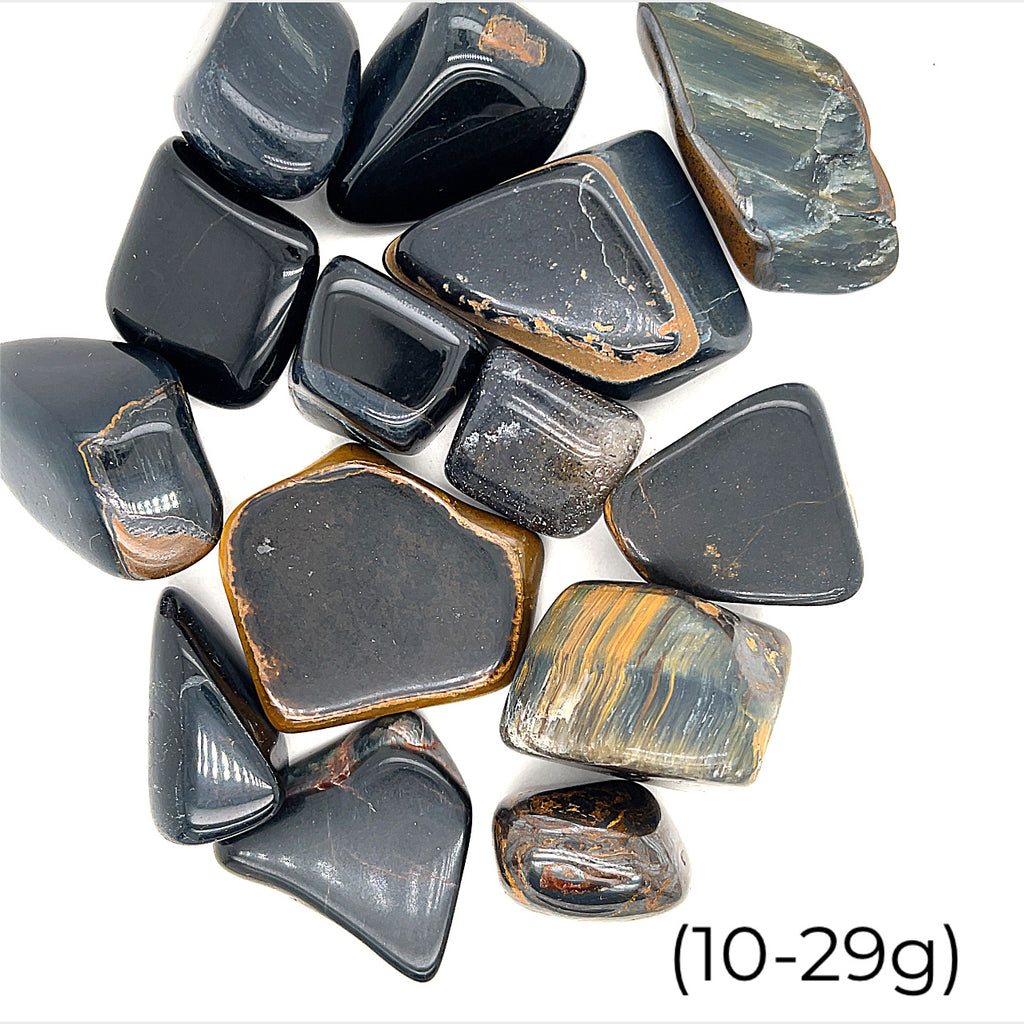 Blue Tiger Eye Tumbled Gemstone grouping on white 10-29g overview