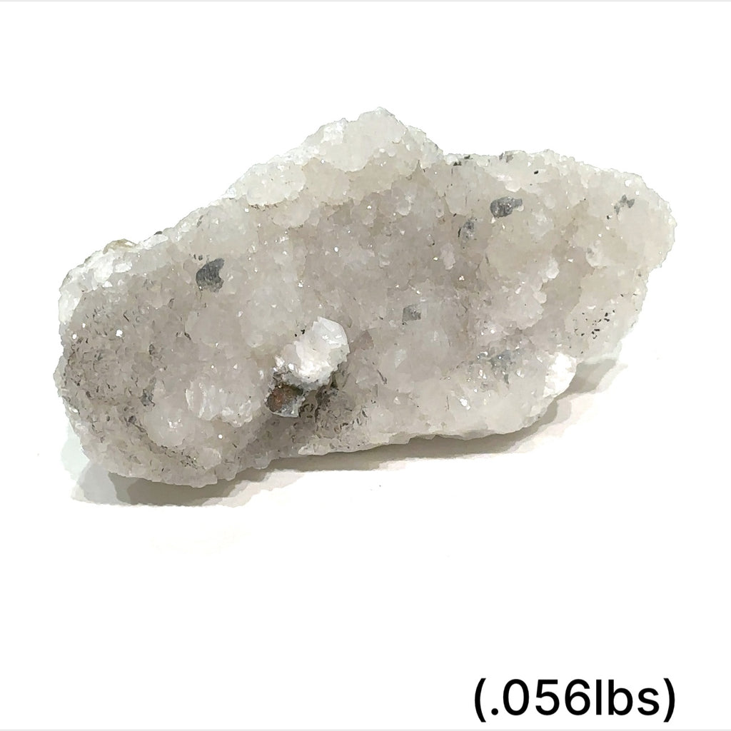 Calcite over Fluorite with Pyrite gemstone showing layered mineral structure and golden inclusions on white background sizes (.056lbs.) overview