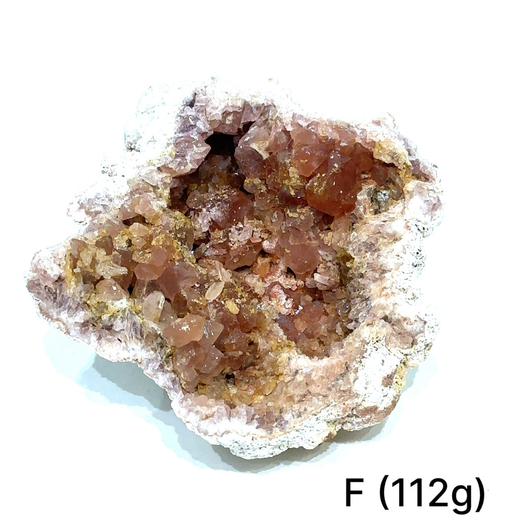 Close-up of AAA-grade Pink Amethyst cluster displaying translucent quartz and texture on white #F (112g)  front view