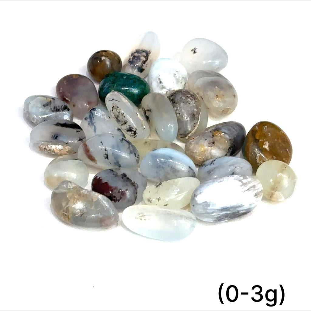 Close-up of Blue Opal crystal with gentle ocean-inspired color variations on white background sizes (0-3g) front overview