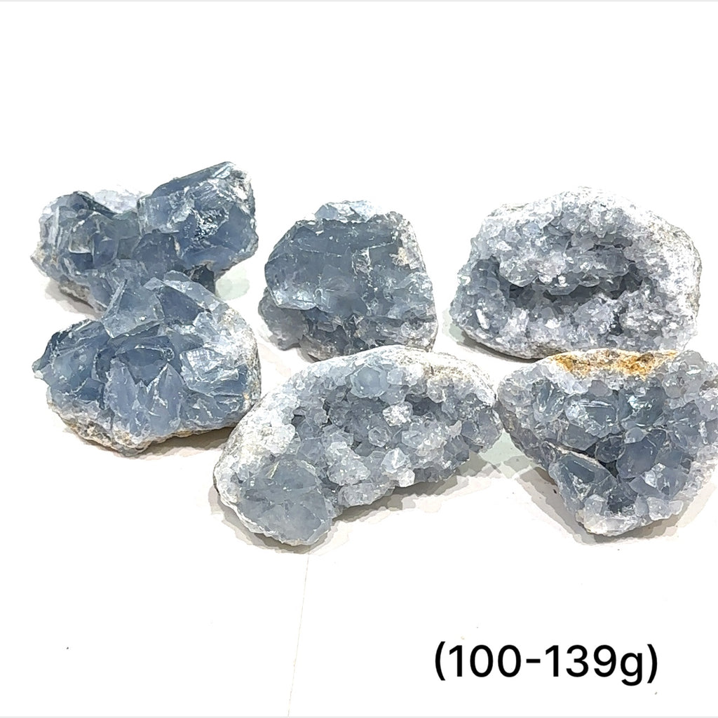 Close-up of Celestite crystal structure showing natural translucence on a white background group sizing (100-139g)