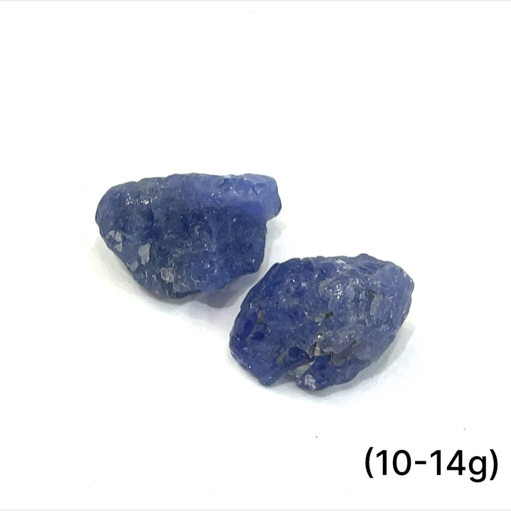 Close-up of Tanzanite crystal showing deep violet-blue hues, on a white background, front view. size (10-14g)
