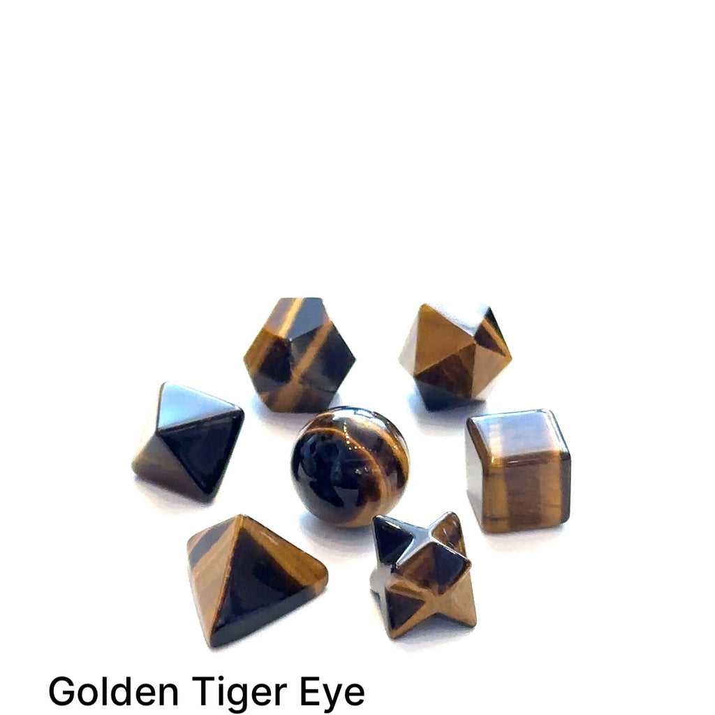 Close-up of Tiger Eye  sacred geometry stones showing polished detail on white overview