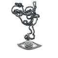 Close-up of pavé diamond Evil Eye pendant showing oxidized texture and sparkle on a white background center long overview.
