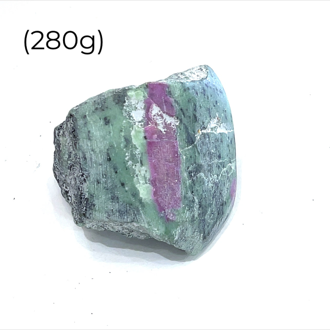 Close-up of raw Ruby in Zoisite showing natural red ruby within green Zoisite matrix (280g) on a white background front overview. 