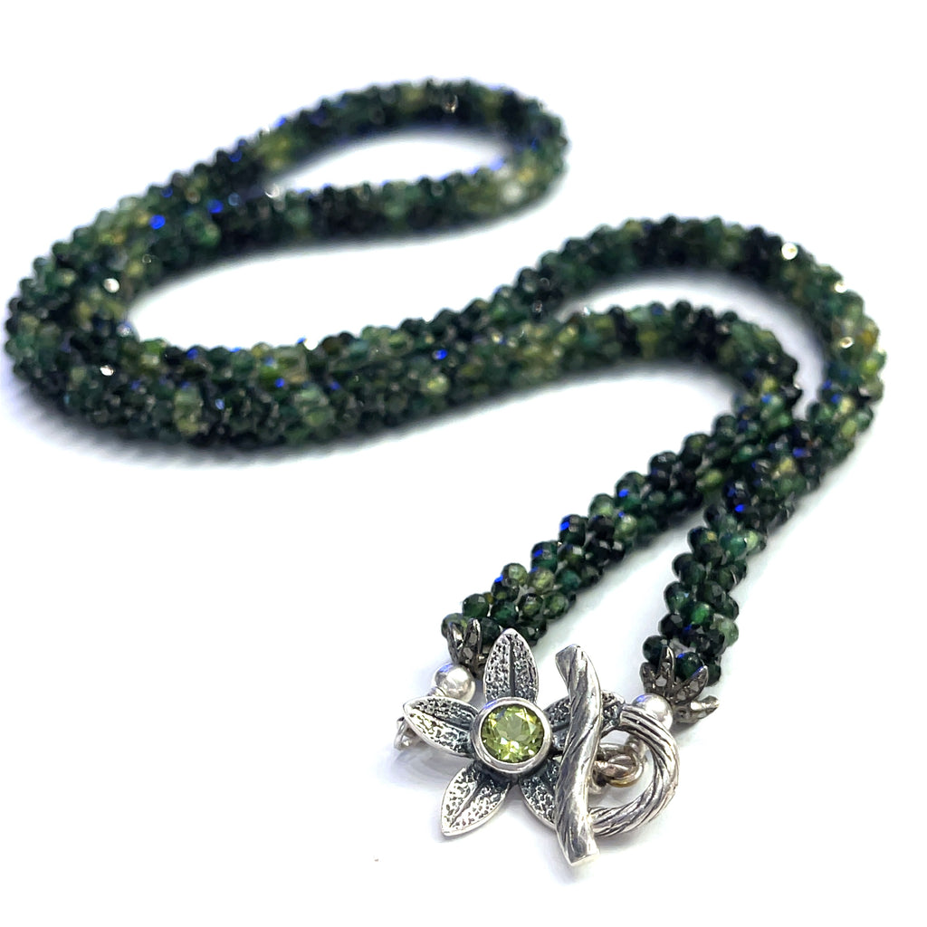 Emerald necklace styled for elegance and everyday wear – a timeless statement of love and abundance. on a white background long, center, toggle overview. 