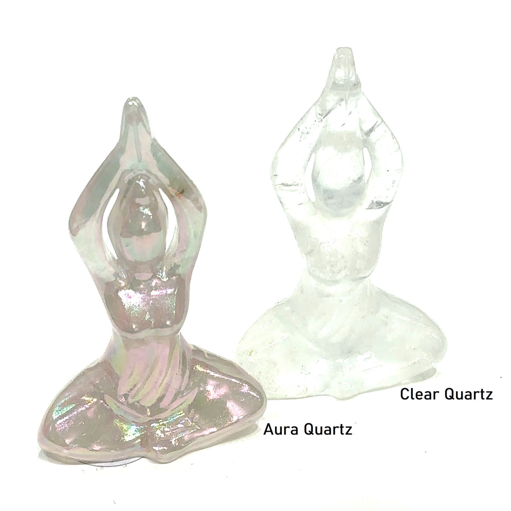 Gemstone yoga lady hand-carved from clear quartz, or aura quartz – healing stone for balance and vitality on white background and front view
