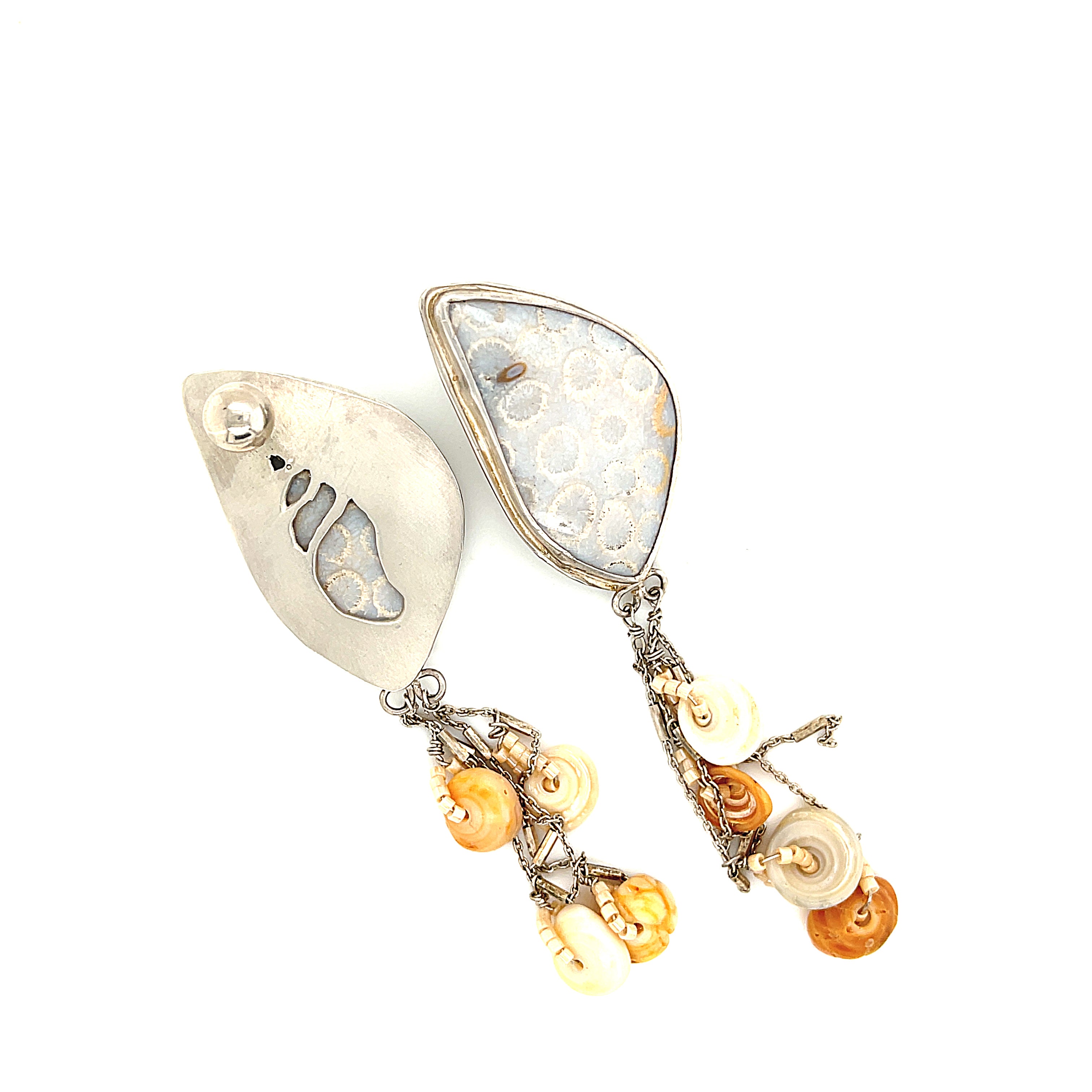 Genuine fossil coral earrings in sterling silver with flower-like patterns on a white background center one front and one back overview. 