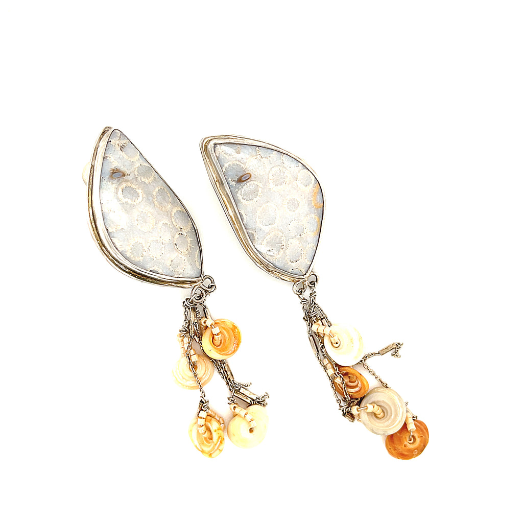 Genuine fossil coral earrings in sterling silver with flower-like patterns on a white background slight right diagonal front overview. 
