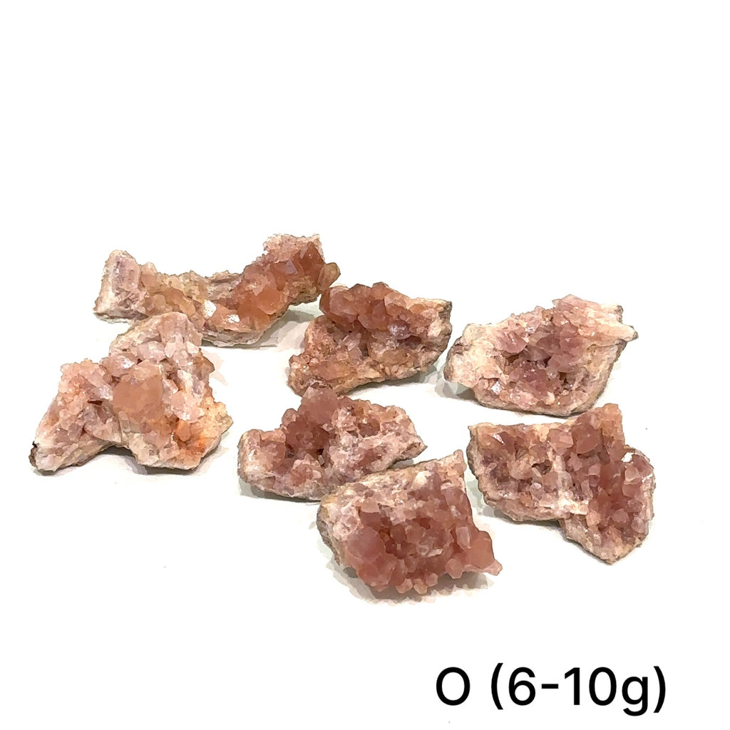 Group of pink amethyst clusters on white background showing natural variations on white # O (6-10g) view