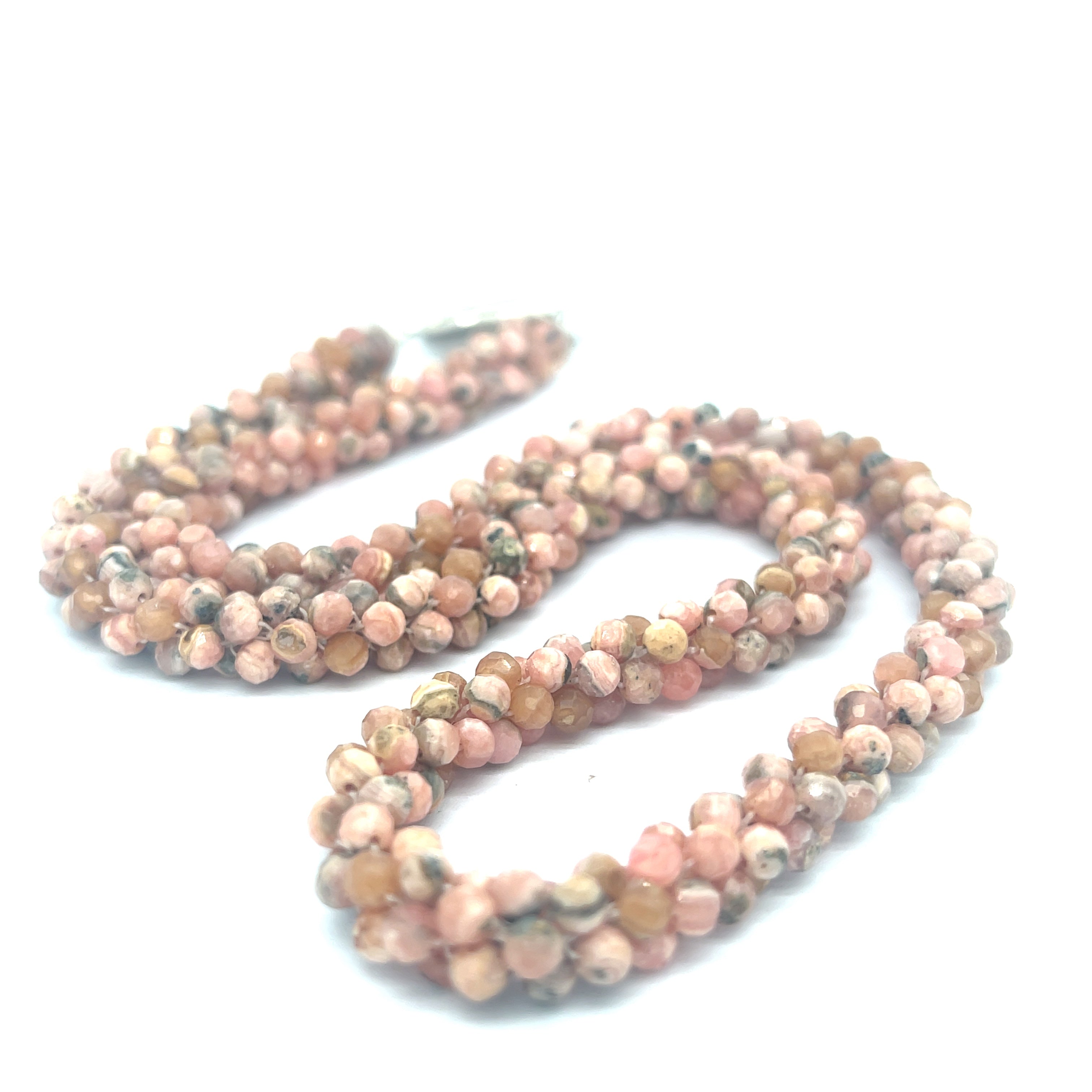 Hand-crocheted Rhodochrosite gemstone necklace with sterling silver toggle and Blue Topaz accent toggle  on a white background, a long center close up overview. 