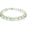 Handcrafted Prasiolite (Green Amethyst) gemstone bracelet with sterling silver toggle clasp by Hidden Jewel Boston on a white background front overview. 