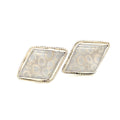 Handcrafted sterling silver fossil coral cuff links with beaded wire design on a white background center forward view.