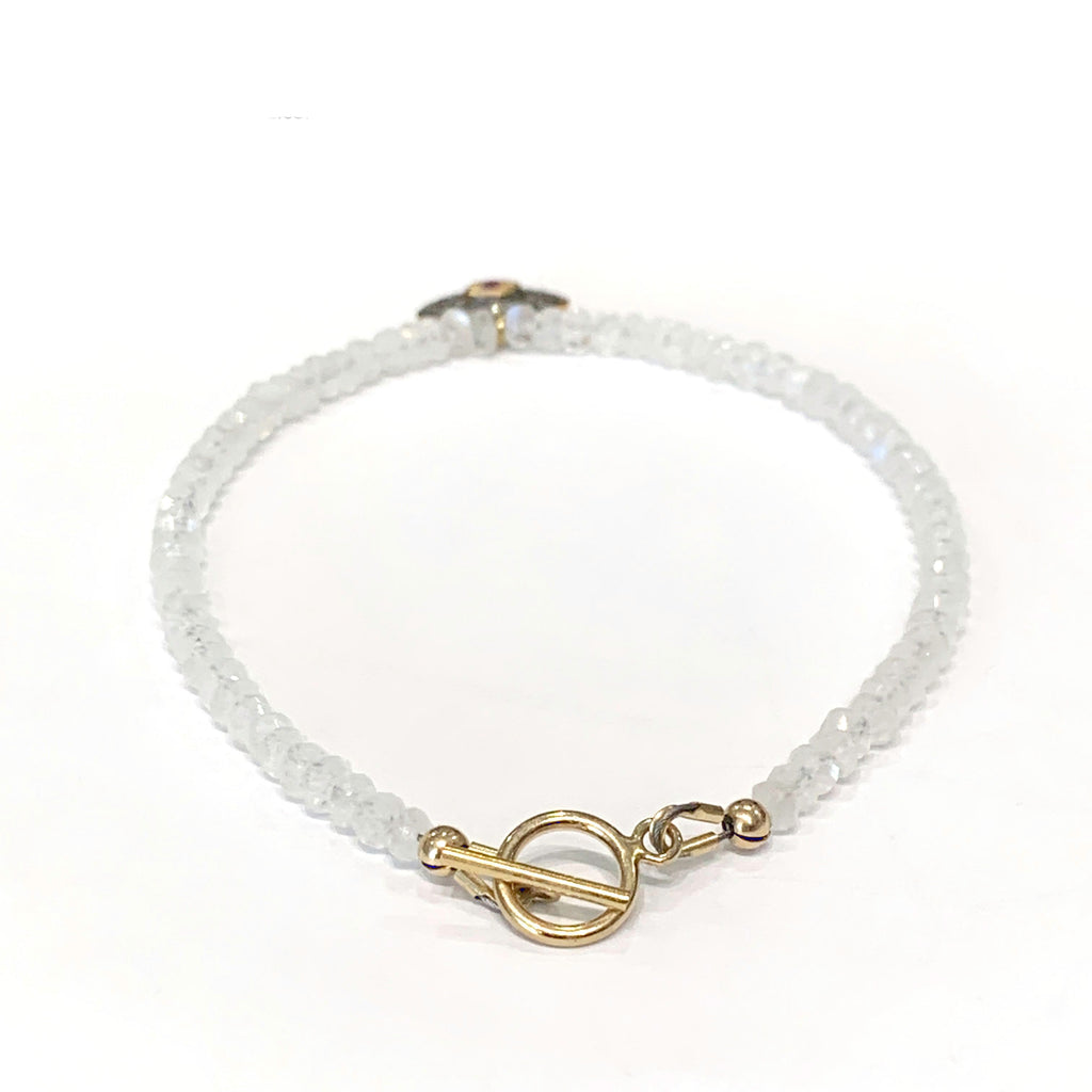 Rainbow Moonstone with a gold filled paved diamond evil eye charm beaded bracelet