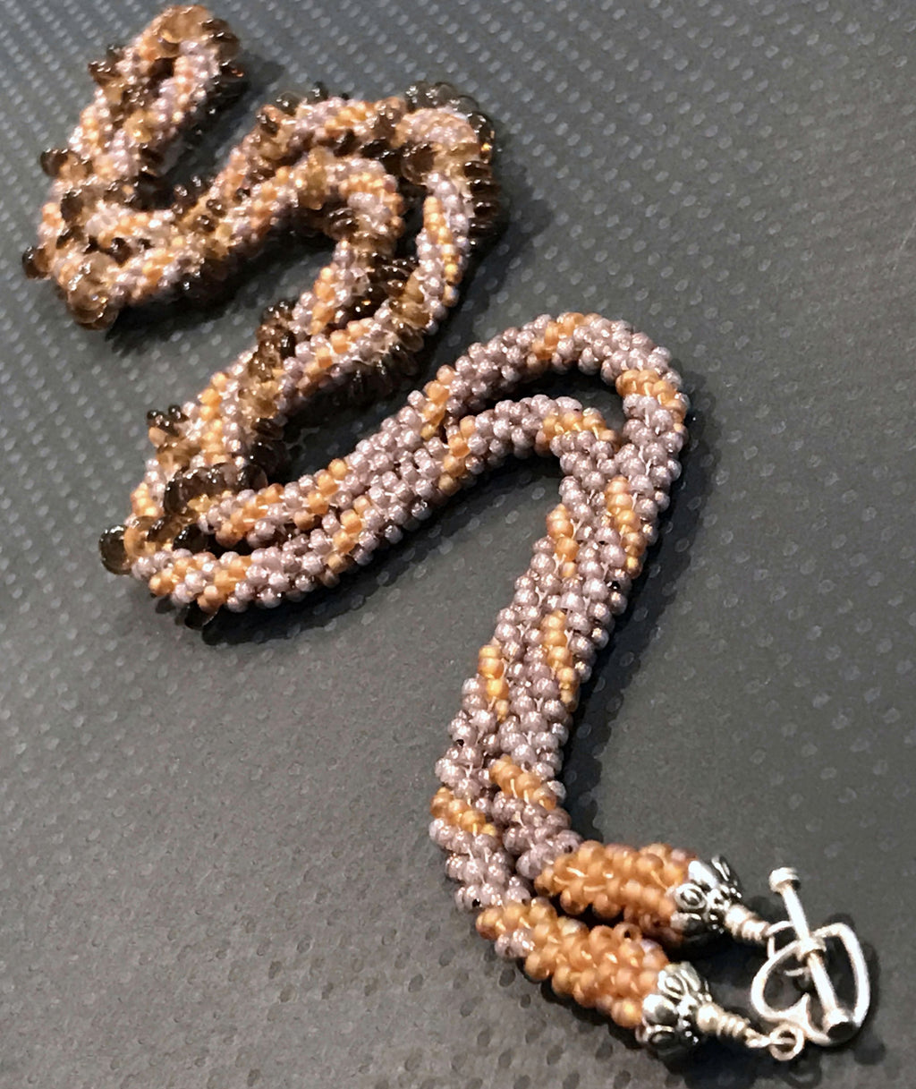 Crocheted Seed Bead necklace with spiral Lentil beads and Silver clasp