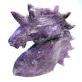 Lepidolite Unicorn used for meditation and emotional balance on a white background right side view. 