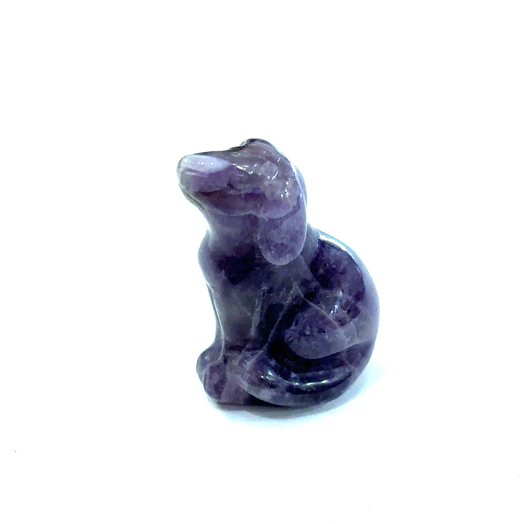 One amethyst hound Dogs gemstone carving on white background, front view.