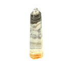 One yellow calcite gemstone towers with black dendritic patterns against a white background, front view. #1
