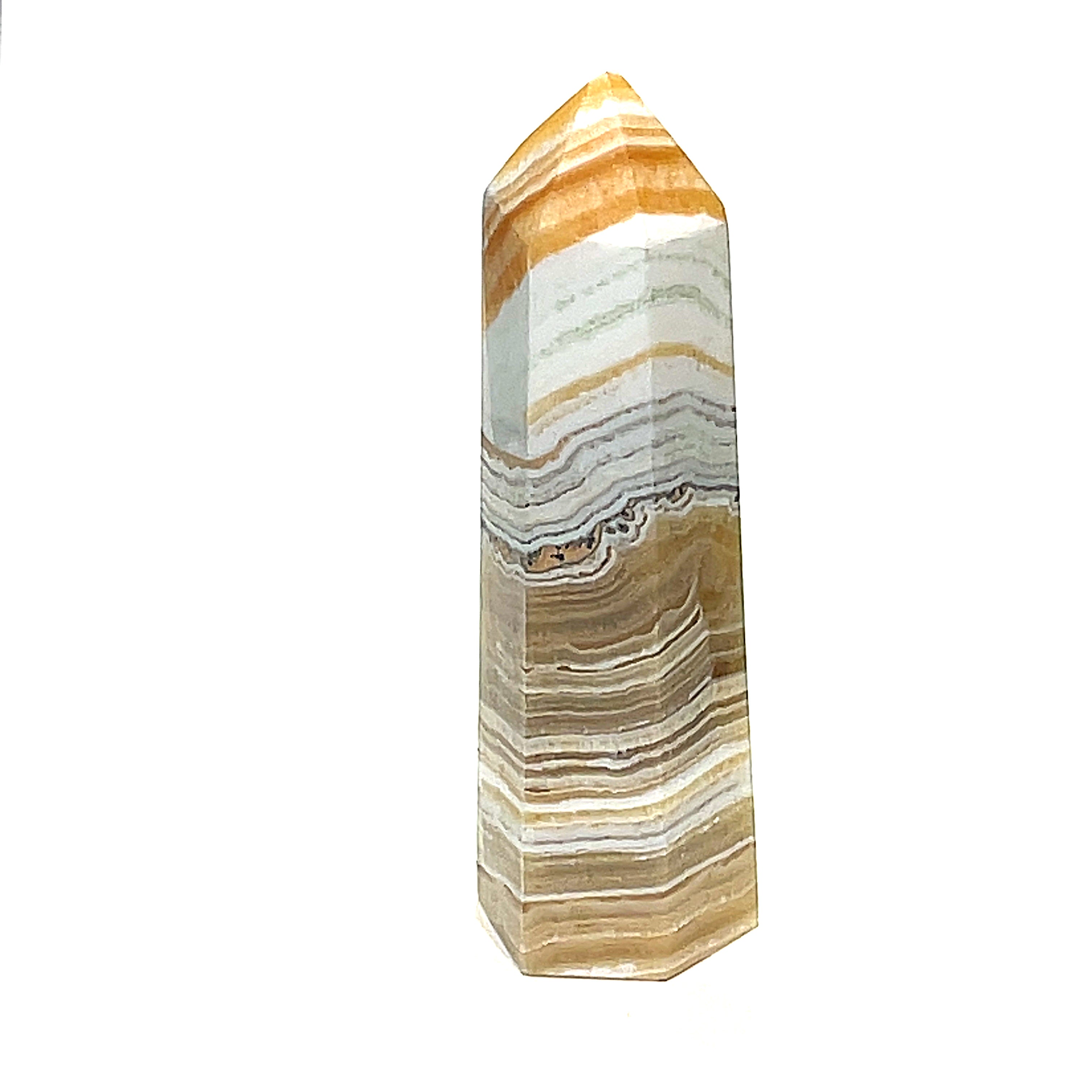 One yellow calcite gemstone towers with black dendritic patterns against a white background, front view. #2