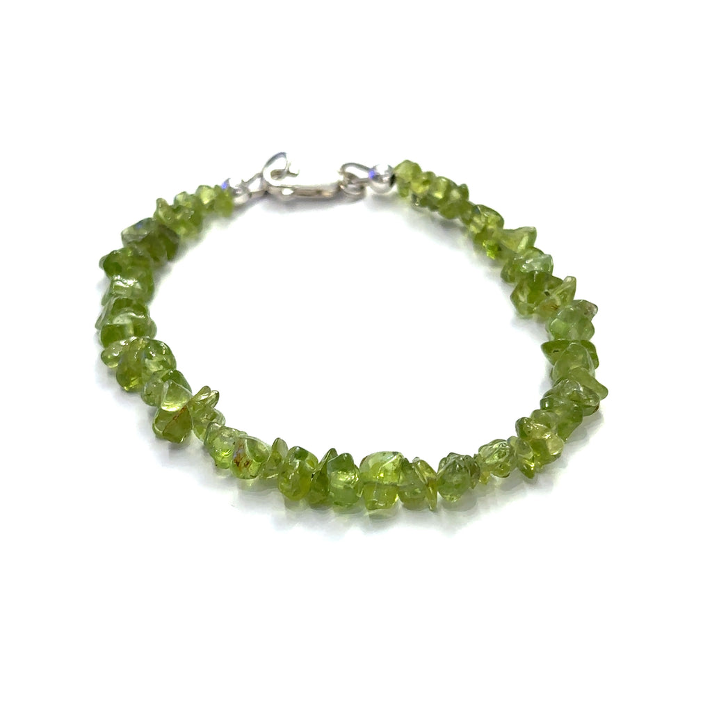 Peridot gemstone bracelets displayed on a white background for healing jewelry collection front overview.