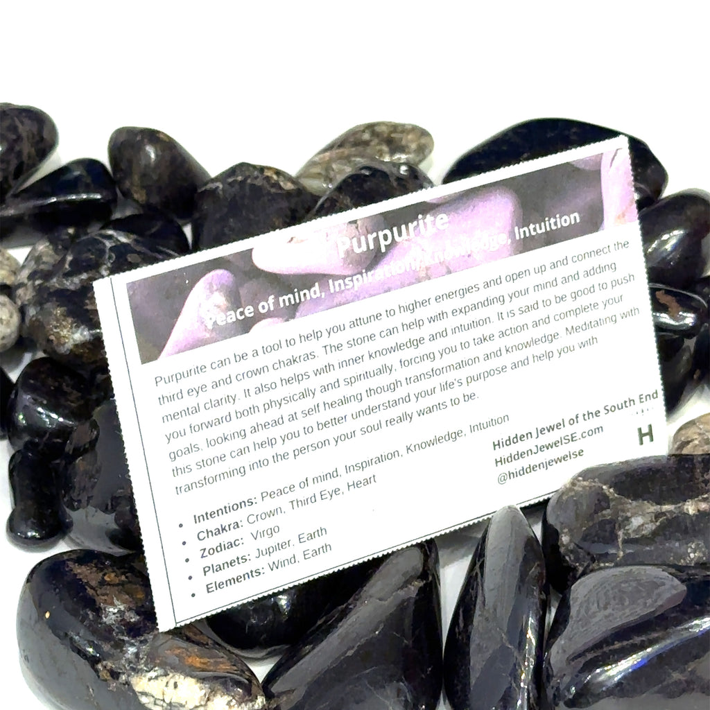 Purpurite gemstone grouping  and gemstone information card on white background front view